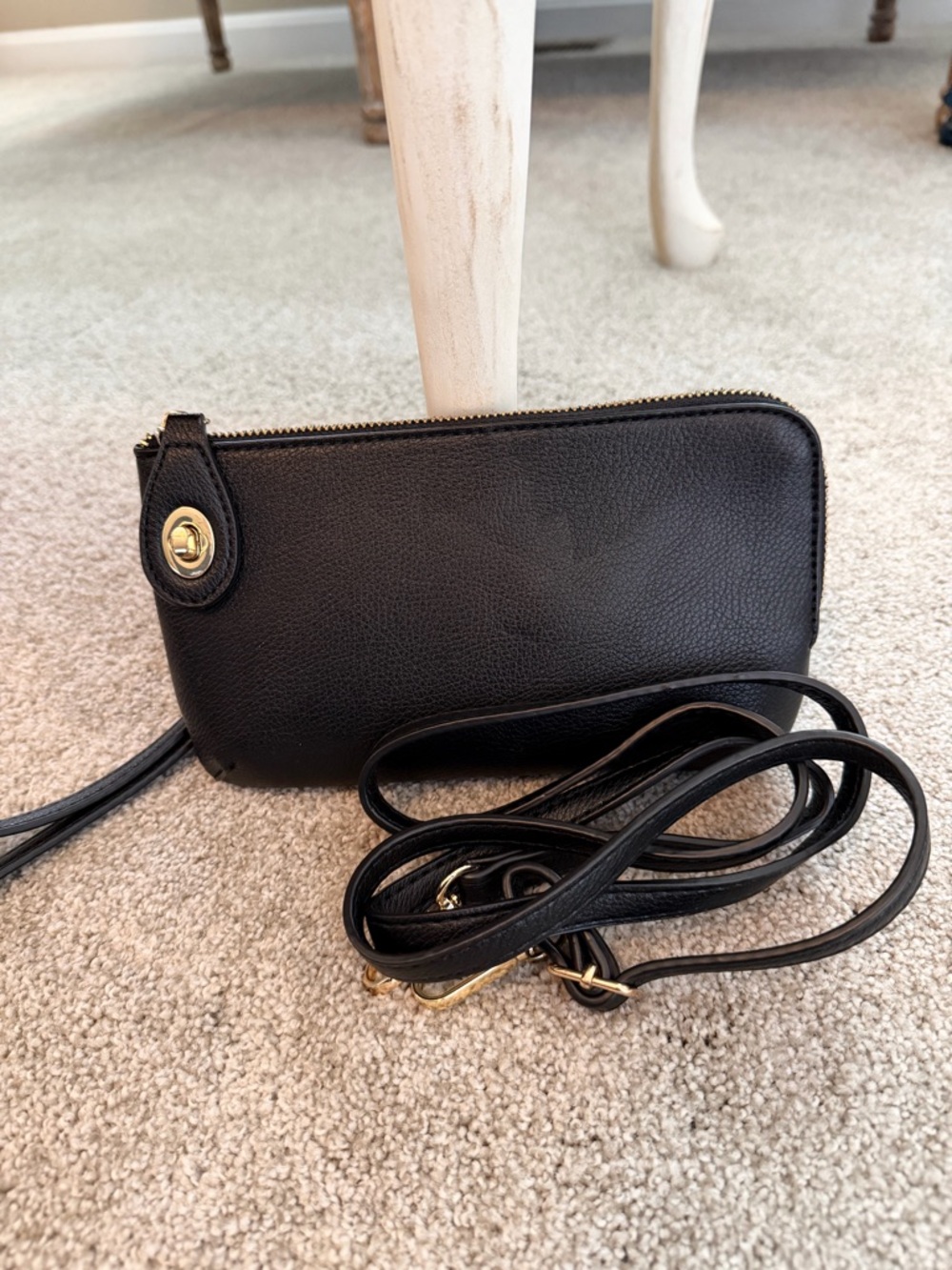 Compact Black Leather Wristlet Clutch with Gold-Tone Accent